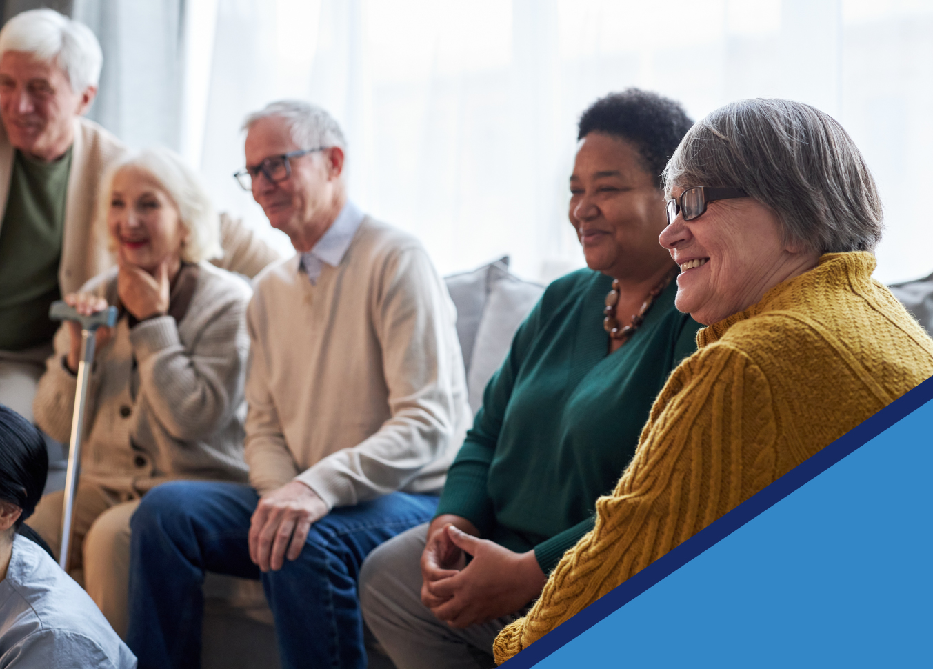 An older crowd gathered around, seated during a training course. Take a seat and read our blog below.